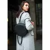 Кожаная женская круглая сумка-рюкзак Maxi черная